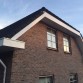 aluminium zetwerk windveer bij woning